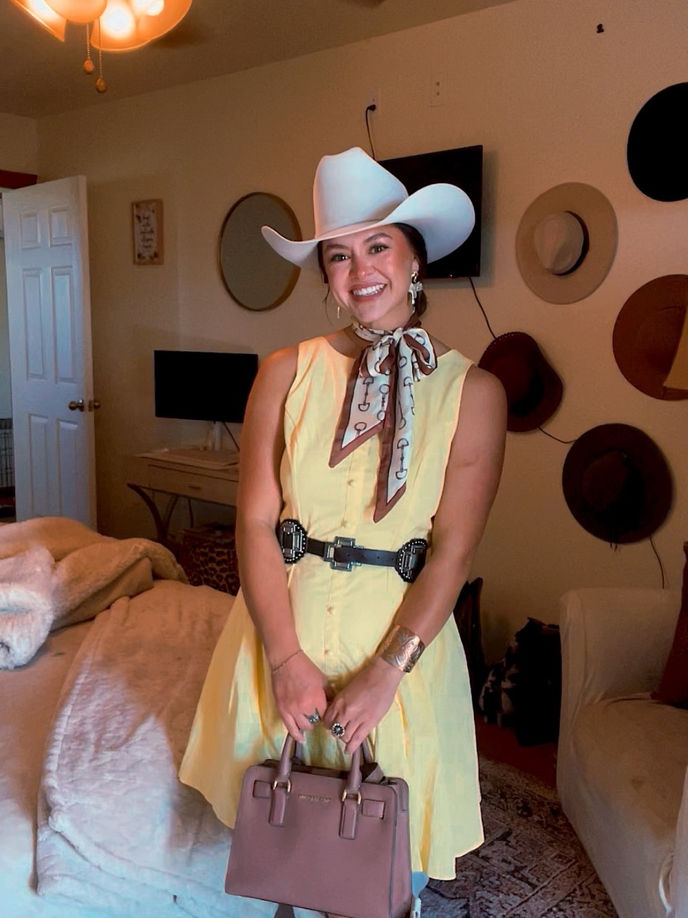 Women’s Yellow Summer Dress with Brown Handbag and White Cowboy Hat